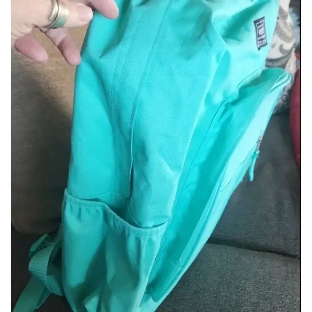 Green Eastport backpack 4 book capacity Laptop sleeve Water bottle pockets NWT